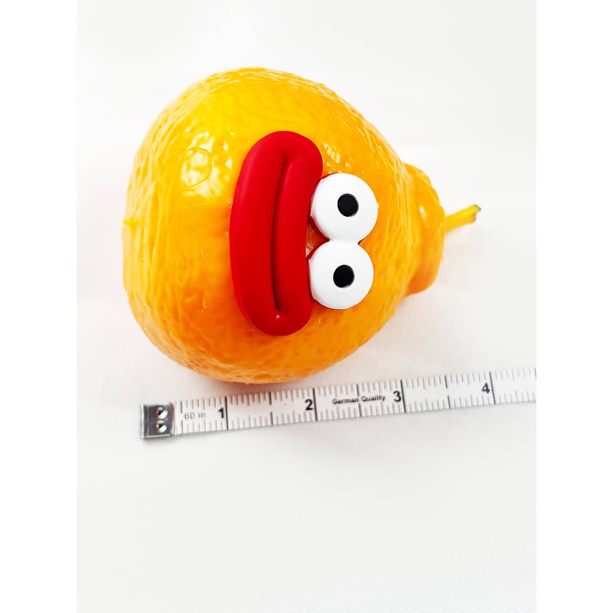 Ugly Orange Pinch Squishy Toy